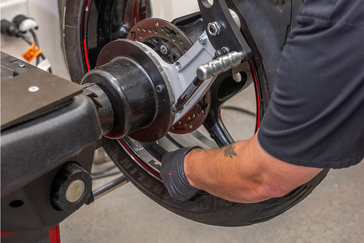 motorcycle-realshop-cyclegear19-cropped.jpg hunter motorcycle wheel service with smartweight pro wheel balancer and tcx table-top tire changer at cycle gear